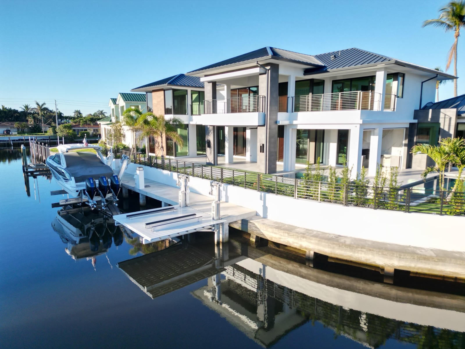 marc julien custom homes (boca concrete dock, jey ski platform lift 27k elevator